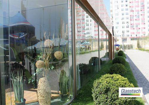 Temperli şeffaf şüşə və qış baxçası sistemi