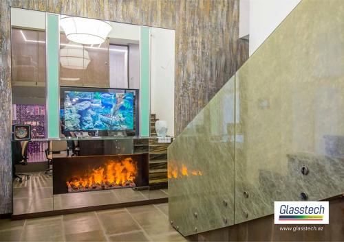 Şüşə perilada istifadə olunan dekorativ şüşələr 2 ədəd 8 mm temperli şüşənin arasına parça qoyularaq ədlə edilmişdir